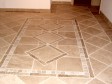 Repräsentativer Eingangsbereich und Flur. Handgefertigtes Naturstein Mosaik für einen unserer Kunden in Bayern.